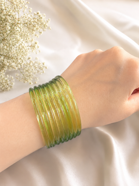 Mint color Ultra-trendy jelly bangles with glossy vibrant shades — the perfect statement stack to elevate your everyday and festive looks (slight variation in color and design is possible) Eight bangles per set (price per set)