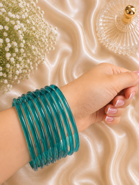 Teal color Ultra-trendy jelly bangles with glossy vibrant shades — the perfect statement stack to elevate your everyday and festive looks (slight variation in color and design is possible) Eight bangles per set (price per set)