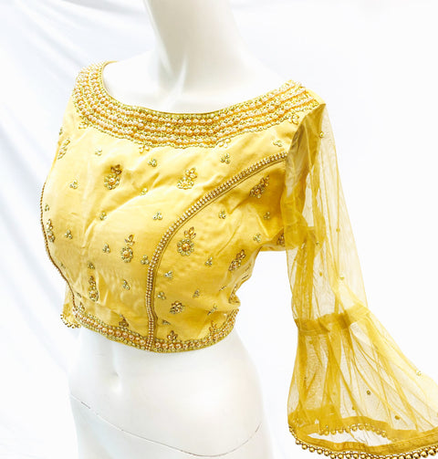 Size 38 Heavy stone work golden blouse (upto size 40)