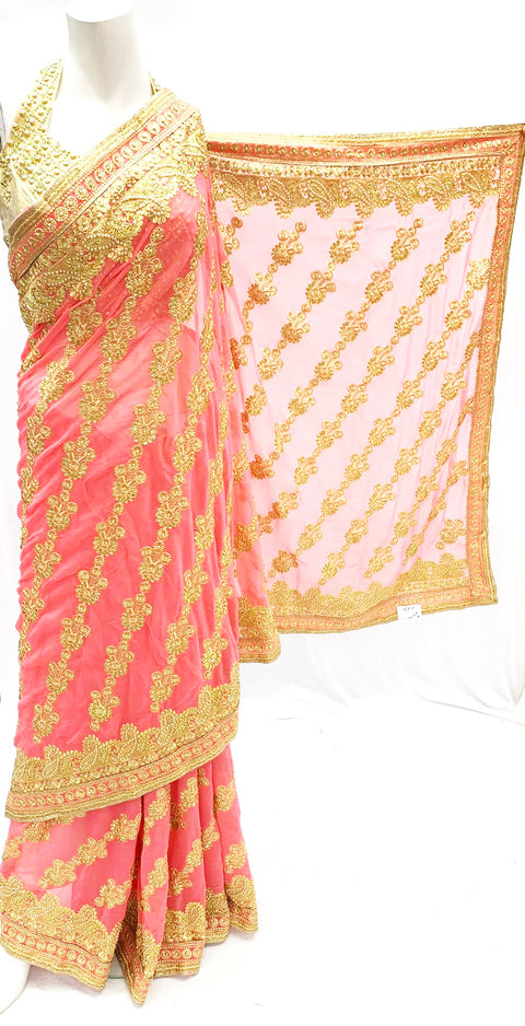 Heavy embroidered saree on  pink pure georgette fabric