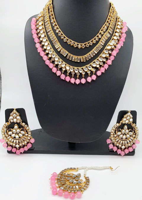 Kundan & baby pink pearls haar set with earrings & Tikka