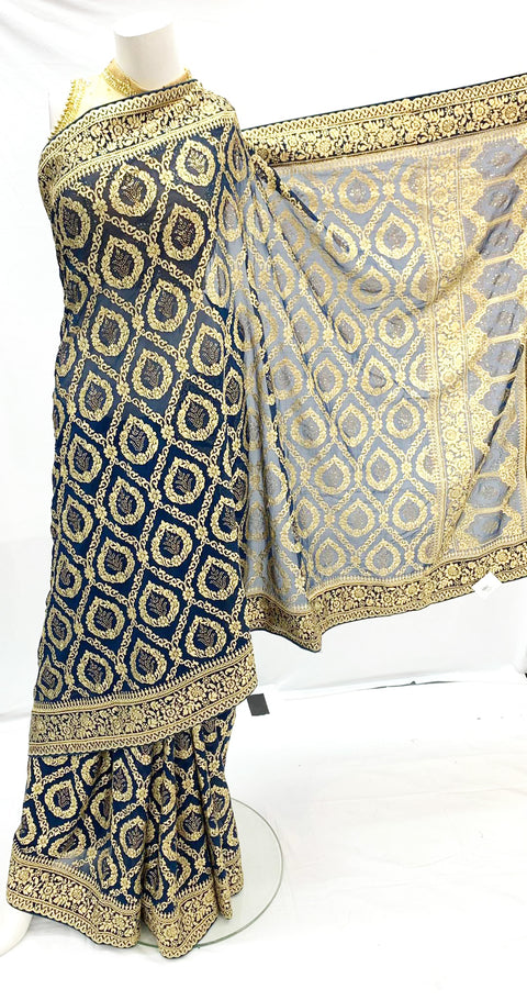 Peacock blue colour georgette based resham thread work with stone design heavy saree