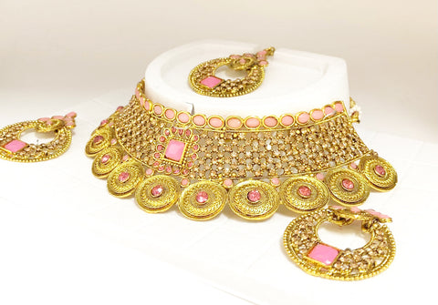 Golden  and lite pink colour beautiful stone work necklace set