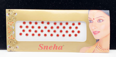 Beautiful golden stone red bindi