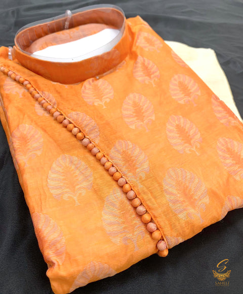 orange colour cotton silk based print design kurta pajama