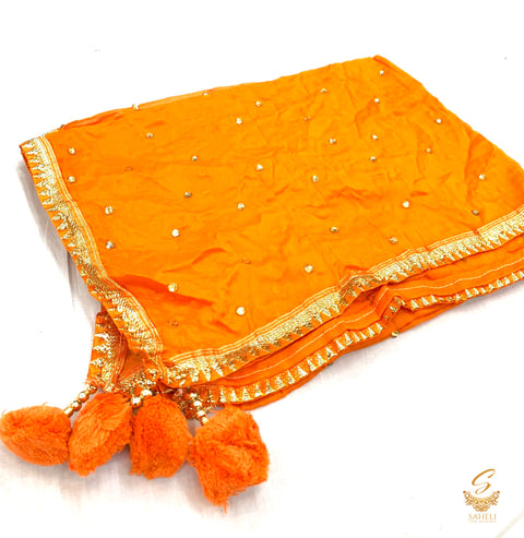 dark orange colour chiffon based golden border dupatta