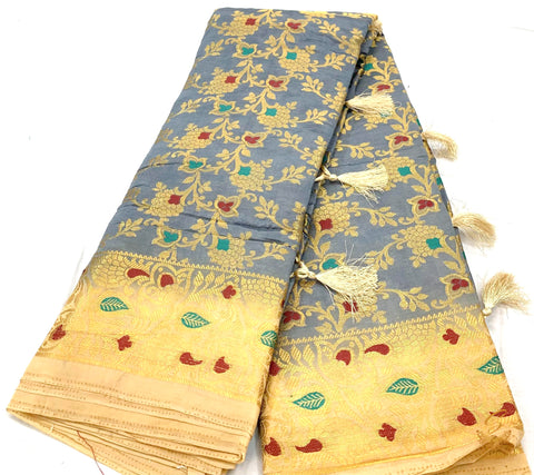 grey  colour brocade soft silk saree with beige contrast pallu and border