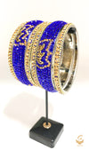 Royal blueand golden stone brass bangles set
