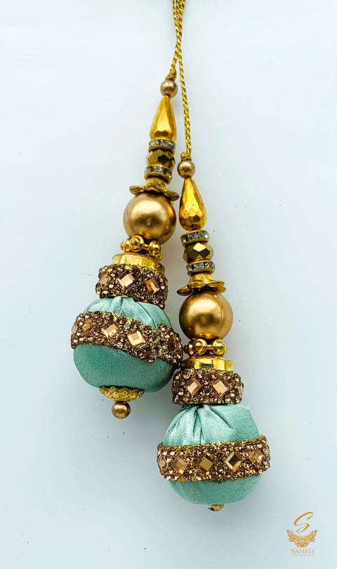 pastel sea foam shade velvet based with stone  & jerkan work latkans 8 cm (pair)