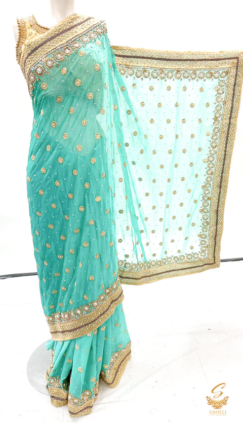 sea green colour soft faux georgette based embroidery & handwork saree