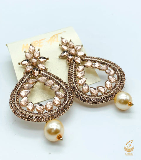 Golden colour stone and pearls beautiful earrings