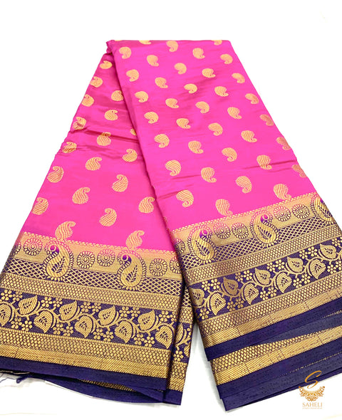 Hot pink color brocade soft silk saree with nevi blue color contrast Pallu and border