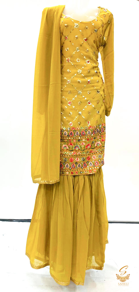 dark mustard colour georgette based heavy embroidered sharara suit