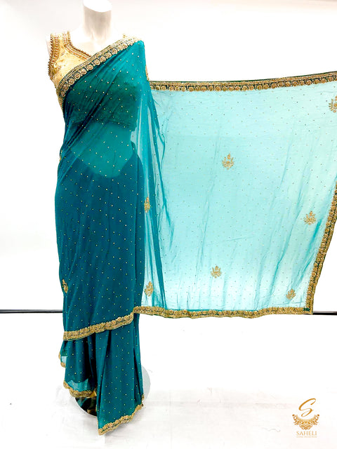 Dark sea green colour handwork all over on soft georgette beautiful saree