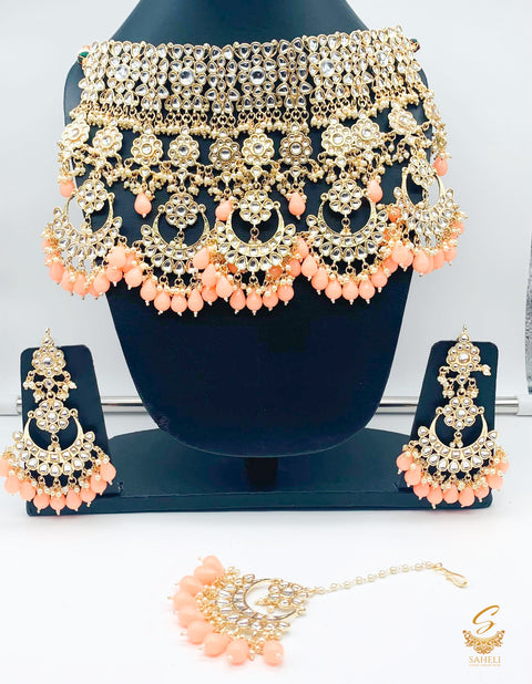 Polki and pearls jadau heavy necklace set  with peach pearls