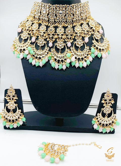 Polki and pearls jadau heavy necklace set  with pastel mint and pink pearls