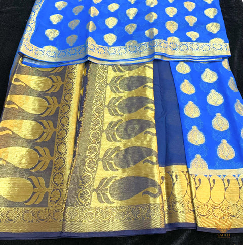 Dark firozi colour chiffon silk saree with contrast blue colour border and pallu