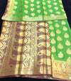 Dark lime green colour chiffon silk saree with contrast maroon colour border and pallu