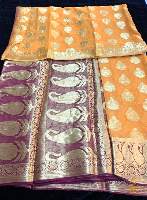 Orange  colour chiffon silk saree with contrast coffee colour border and pallu