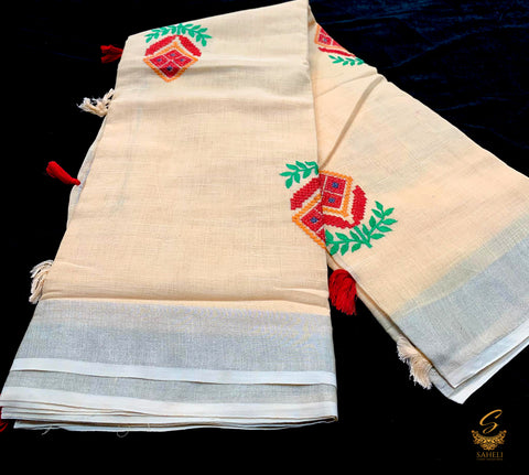 pastel peach colour linen saree with embroidery work