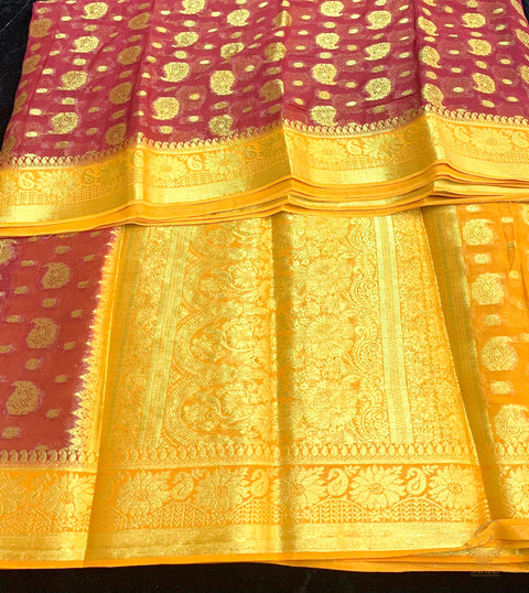 Dark maroon colour chiffon silk saree with contrast deep mustard colour border and pallu