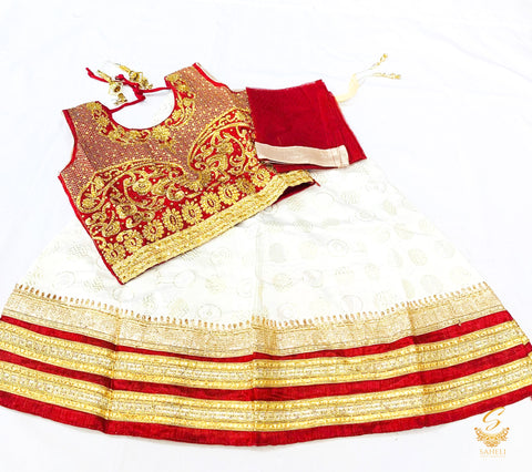Maroon velvet heavy stone work blouse with golden cream colour silk lehnga with dupatta