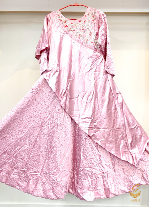 Pastel pink colour silk based stone work beautiful gown