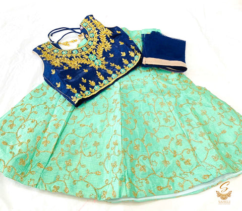 Nevi Blue colour silk based blouse with embroidery & Stone work with Dark sea green silk embroidered Lehnga & netting dupatta