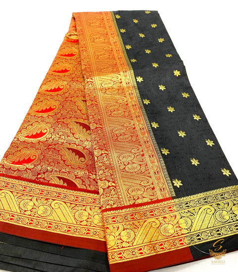 Black colour banarsi brocade silk saree with maroon border and pallu