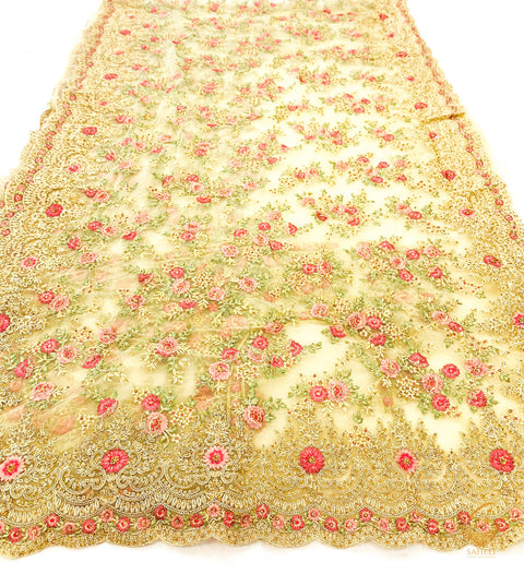 Dark Golden colour netting based heavy embroidery floral jaal work with stones all over with heavy work on blouse