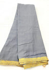 Dark grey colour pure chinnon plain saree with zari border