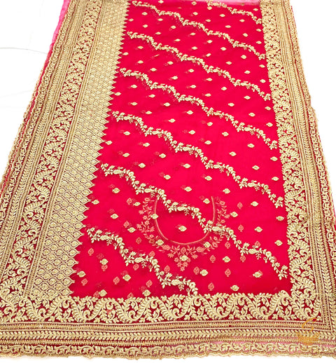 Dark Mazenta colour netting based heavy embroidery jall all over with beautiful stone work heavy border and embroidered work design on blouse