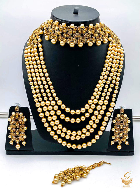 Golden stone with golden pearls small choker with long rani haar neckalce set