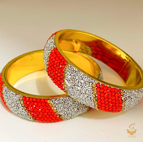 Red colour crystal pearls with shimmer silver crystal work kade set ( 2 Kade)