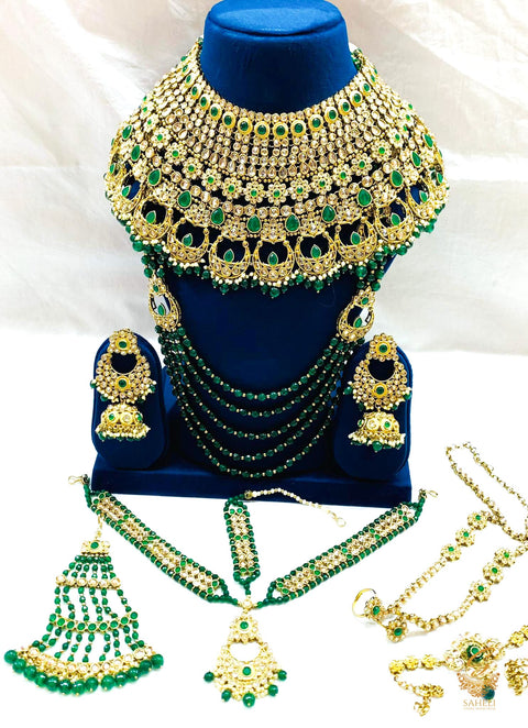 Polki stone and Bottle green colour stone with pearls Beautiful Bridal Necklace Set With Heavy Earrings ,Tikka , Matha Patti , pasa And 2 Hands Jwellery , Rani Haar  & Nath