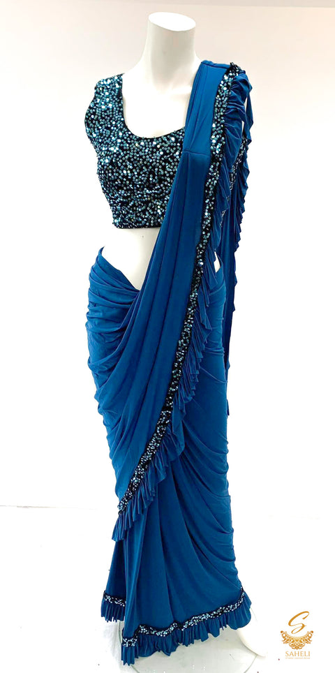 Size 38(upto 40) black blue colour velvet based sequined readymade blouse with readymade dark firozi colour saree