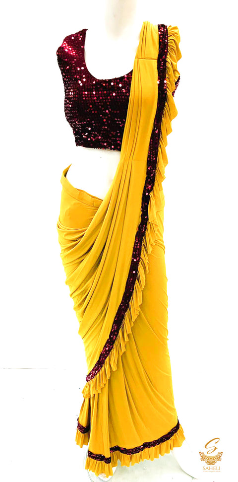 Size 38(upto 40) Maroon colour velvet based sequined readymade blouse with readymade mustard saree