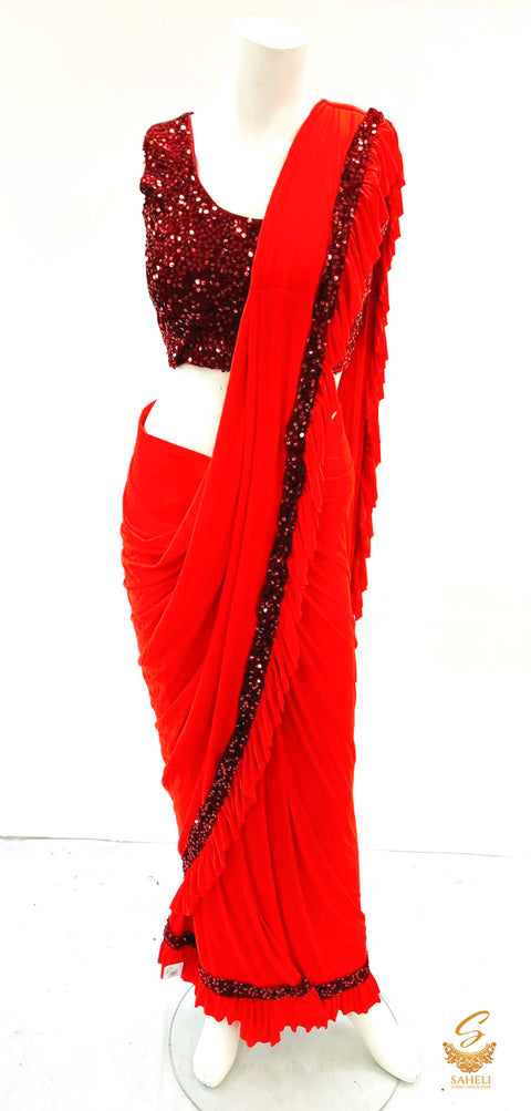 Size 38(upto 40) Maroon colour velvet based sequined readymade blouse with readymade dark Red colour saree