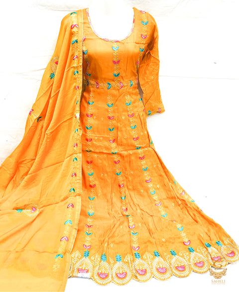 size 40-42 Merigold colour very tassar silk beautiful embroidery work on front & back anarkali suit with unstitched bottom pents (can be stitched anystyle, we provide stitching) & Pure chinnon full size heavy embroidery work Merigold colour dupatta