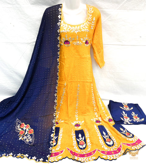 size 42-44 Dark mustard colour very soft chiffon silk beautiful gotta patti work on front & back anarkali suit with unstitched bottom pents (can be stitched anystyle, we provide stitching) & Pure chinnon full size heavy gotta patti work nevi blue colour d