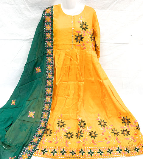 size 40-42 Dark Mustard colour tassar silk beautiful handwork embroidery on front & back anarkali suit with unstitched bottom pents (can be stitched anystyle, we provide stitching) & Pure chinnon full size heavy embroidery work dark green colour dupatta