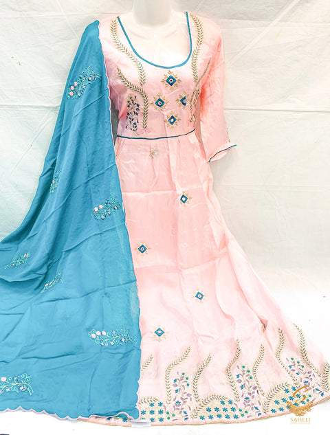 size 44 Pastel pink colour very tassar silk beautiful embroidery work on front & back anarkali suit with unstitched bottom pents (can be stitched anystyle, we provide stitching) & Pure chinnon full size heavy embroidery work teal colour dupatta