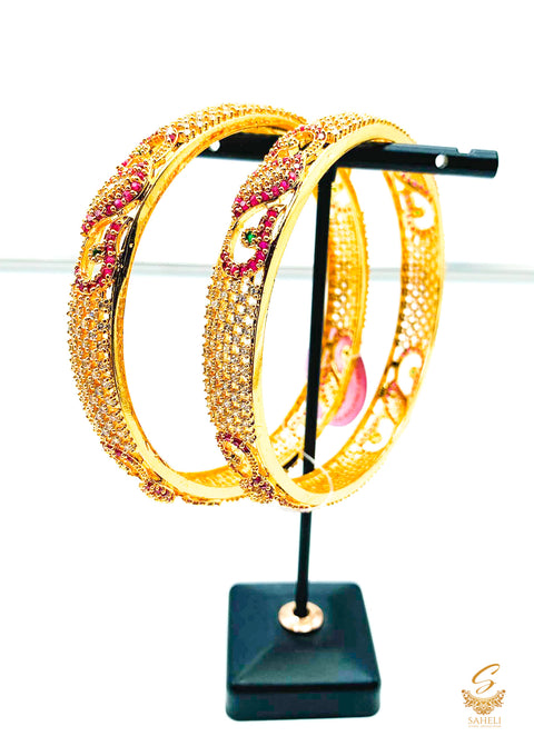 Golden and Mazenta stone American Diamond Kade Set