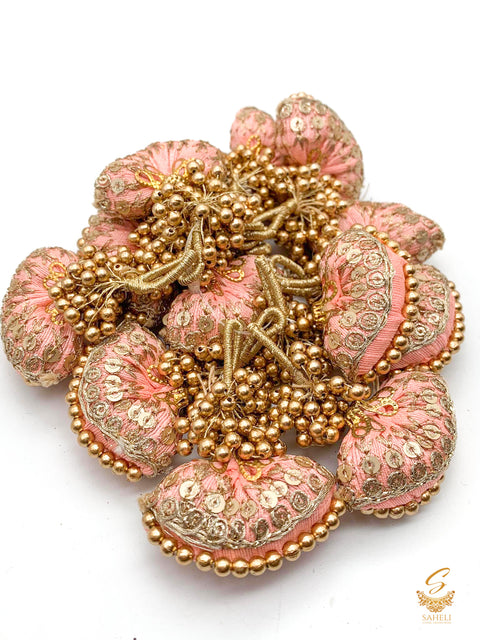 Pastel baby pink colour cushioned latkan with handwork and moti bunch work (PER PAIR)