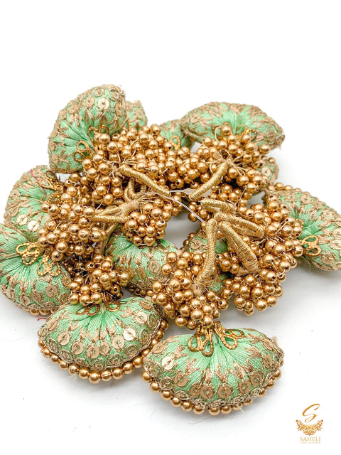 Pastel mint colour cushioned latkan with handwork and moti bunch work (PER PAIR)