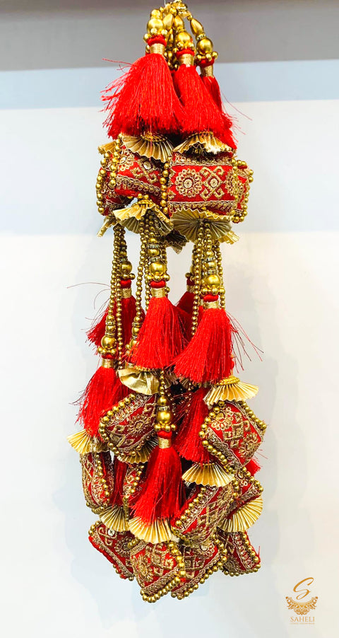 Red Embroidered Cushioned And Pearls Work Long Latkan (one pair)