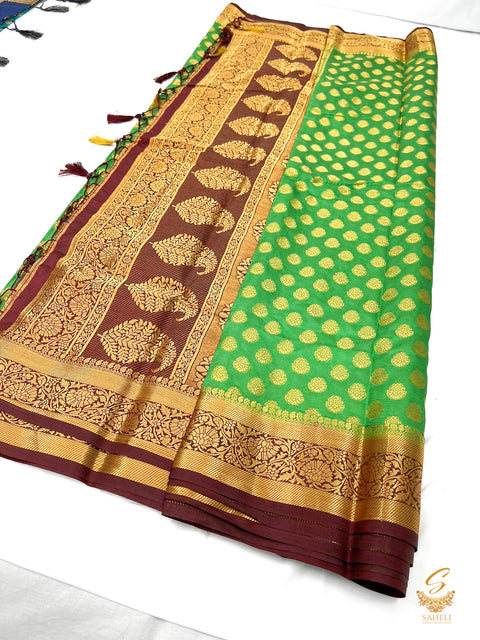 Dark green colour art silk saree with brown colour pallu