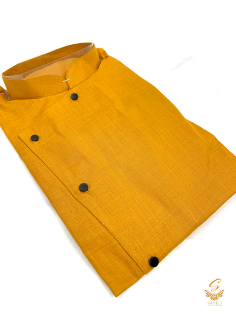 Mustard colour cotton linen based side button and cut work bottom style kurta with white Pents