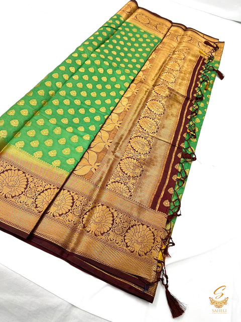 Green colour art silk saree with brown maroon colour pallu