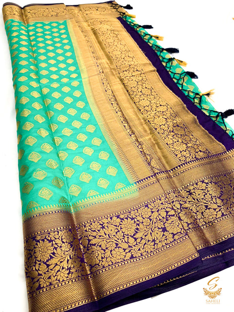 Sea green colour art silk saree with nevi blue colour pallu